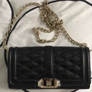 Black Rebecca Minkoff crossed body wallet.